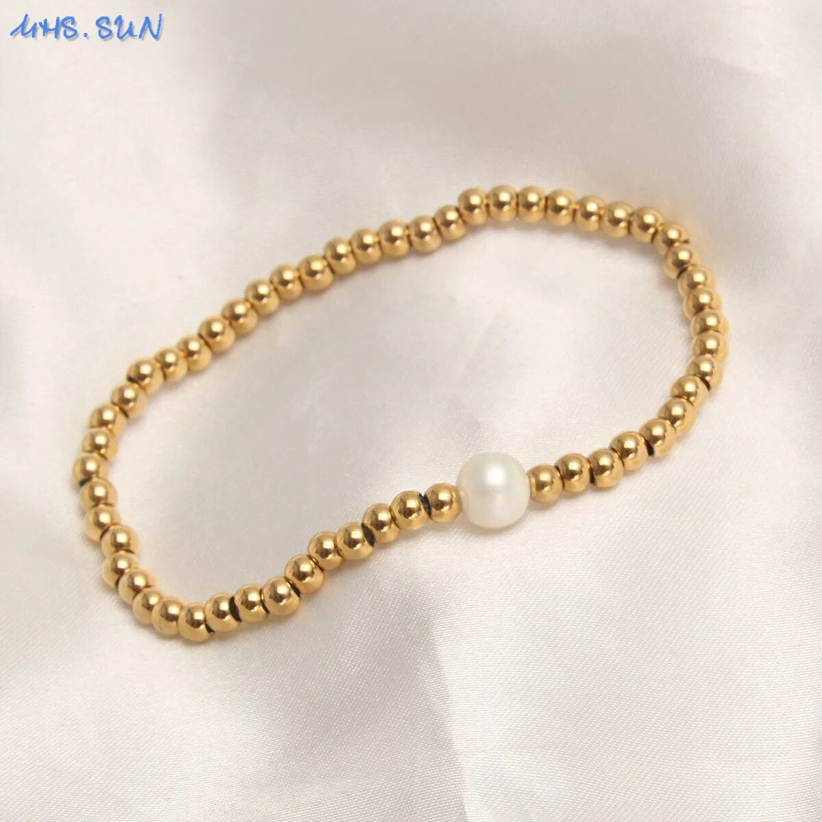 Golden Plated Stainless Steel Elastic Rope Bracelet with Pearl Bead Accent Women Bracelets