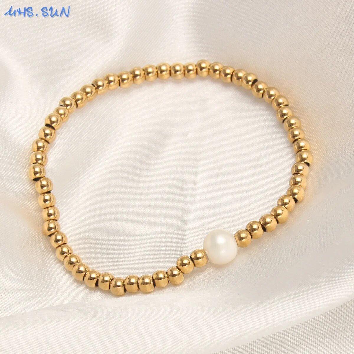 Golden Plated Stainless Steel Elastic Rope Bracelet with Pearl Bead Accent Women Bracelets