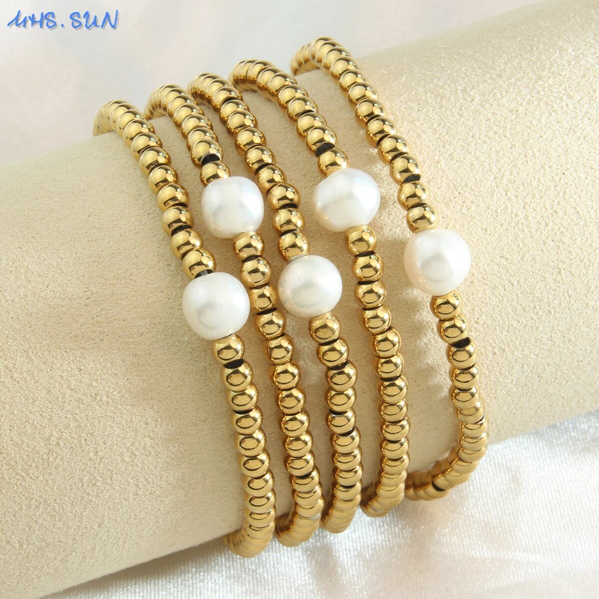 Golden Plated Stainless Steel Elastic Rope Bracelet with Pearl Bead Accent Women Bracelets