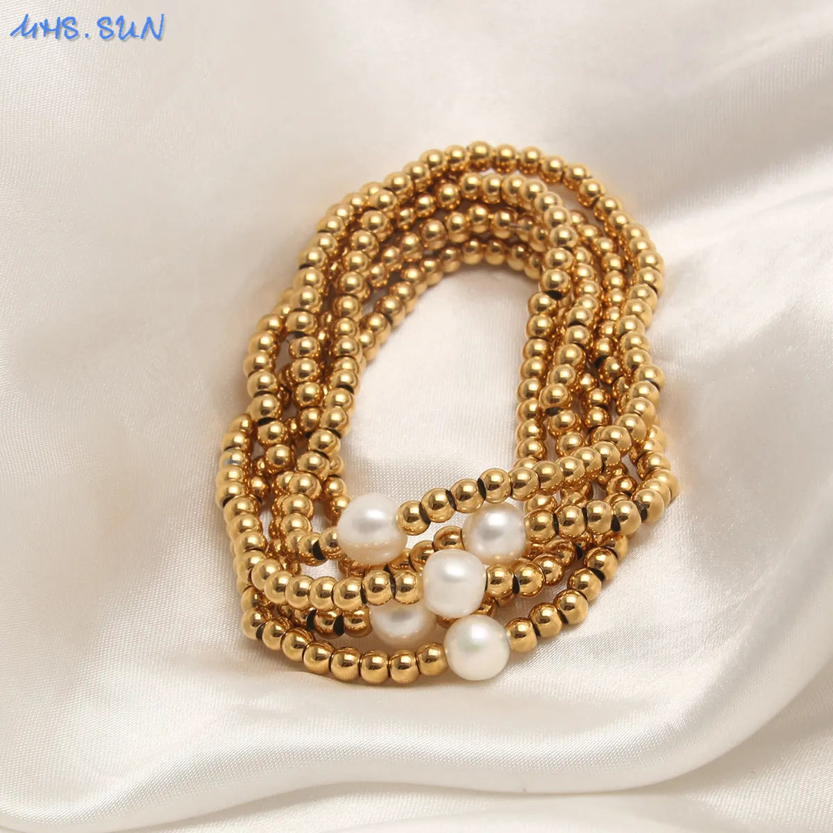 Golden Plated Stainless Steel Elastic Rope Bracelet with Pearl Bead Accent Women Bracelets