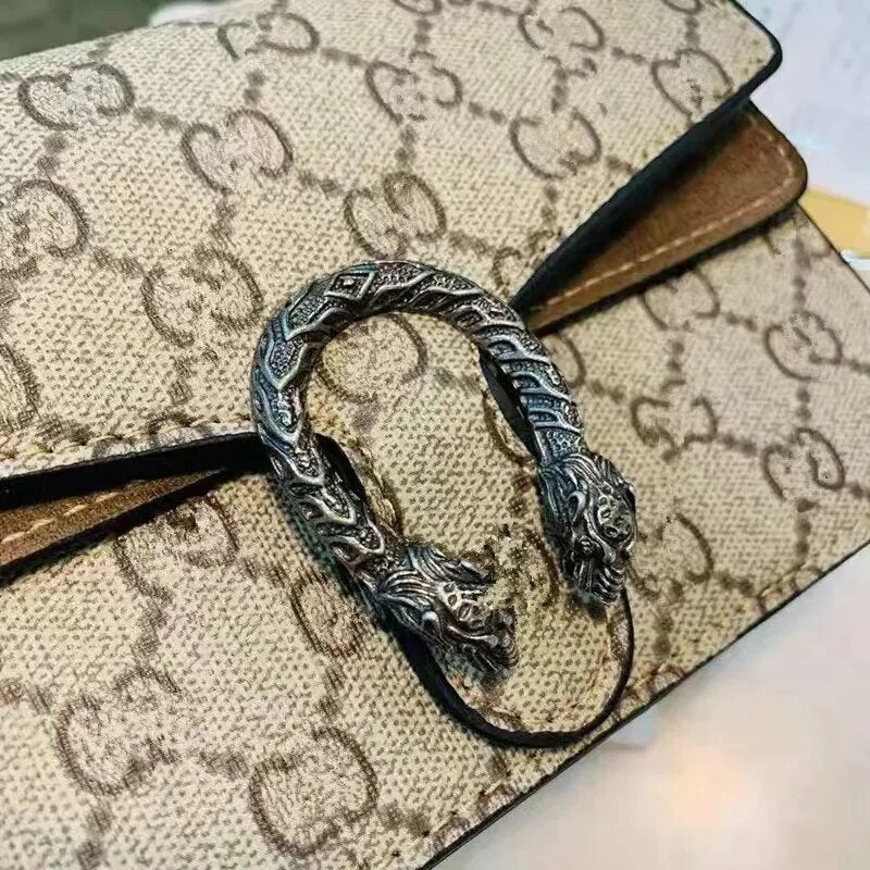 2023 New niche design high-end solid color single shoulder portable leather women's bag with crossbody chain small bag