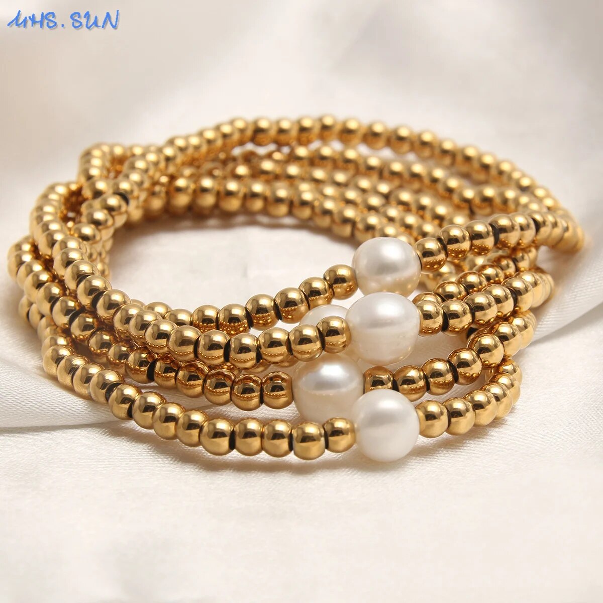 Golden Plated  Stainless Steel Elastic Rope Bracelet with Pearl  Bead Accent Women Bracelets